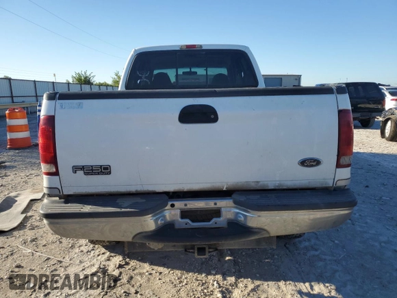 1999 Ford Super Duty F-250 XL with VIN 1FTNW21F6XEC74075, listed as a Copart auction lot 52581155 with 118,630 mi miles and Salvage Title. Bid and sale history available at carsss.com. Image 6.