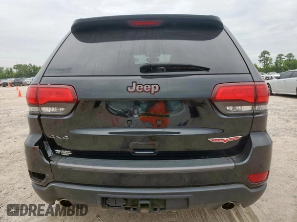 2019 Jeep Grand Cherokee Trailhawk with VIN 1C4RJFLG8KC613582, listed as a Copart auction lot 62901405 with 136,809 mi miles and Salvage title. Bid and sale history available at DreamBid. Image 6.