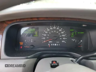 1999 Lincoln Town Car Executive z VIN 1LNHM81W4XY714116, wystawiony jako Copart lot #44424595 z przebiegiem 210 041 mil mil oraz Szkoda całkowita • Salvage title. Historia ofert i sprzedaży dostępna na DreamBid. Obrazek 9.