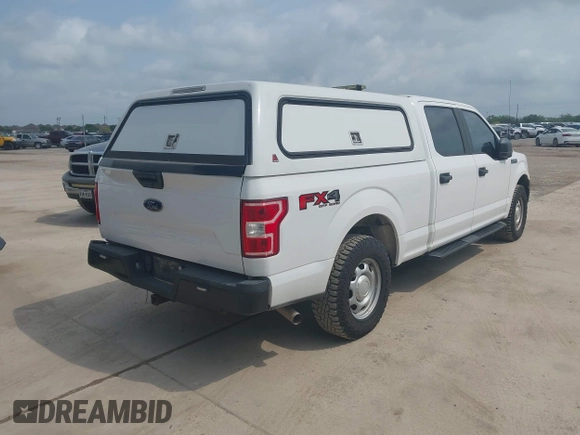 2018 Ford F-150 XL with VIN 1FTFW1E53JKC39874, listed as a IAAI auction lot 42099372 with 111,563 mi miles. Bid and sale history available at carsss.com. Image 4.