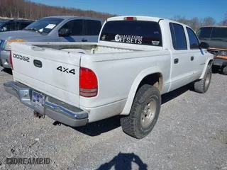 2001 Dodge Dakota Sport with VIN 1B7HG2AN21S290140, listed as a IAAI auction lot 41702251 with 350,678 mi miles. Bid and sale history available at carsss.com. Image 4.