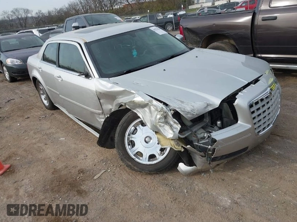 2005 Chrysler 300 with VIN 2C3JA53G85H159623, listed as a IAAI auction lot 41773424 with 127,764 mi miles. Bid and sale history available at carsss.com. Image 1.