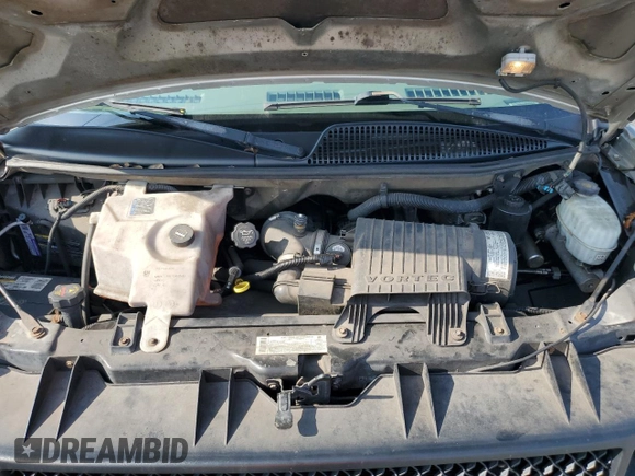 2004 Chevrolet Express Passenger with VIN 1GAHG39U741128458, listed as a Copart auction lot 64436215 with 118,387 mi miles and Salvage title. Bid and sale history available at DreamBid. Image 12.