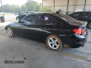 2015 BMW 3 Series 328i with VIN WBA3A5G51FNS87379, listed as a Copart auction lot 57752165 with 56,802 mi miles and Salvage title. Bid and sale history available at DreamBid. Image 2.