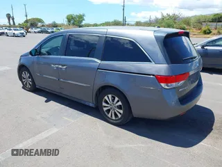 2014 Honda Odyssey EX-L with VIN 5FNRL5H69EB018557, listed as a IAAI auction lot 42855051 with 165,081 mi miles and . Bid and sale history available at DreamBid. Image 3.