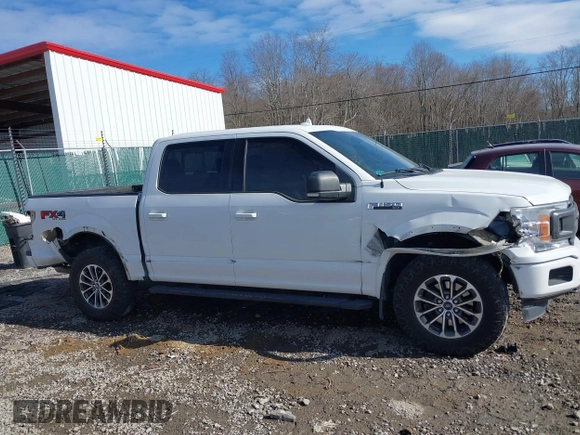 2018 Ford F-150 XL with VIN 1FTEW1E5XJFE20779, listed as a IAAI auction lot 41705616 with 138,996 mi miles and . Bid and sale history available at DreamBid. Image 13.