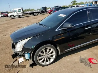 2013 Cadillac XTS Luxury z VIN 2G61P5S35D9172074, wystawiony jako Copart lot #71996124 z przebiegiem 122 338 mil mil oraz Szkoda całkowita • Salvage title. Historia ofert i sprzedaży dostępna na DreamBid. Obrazek 10.