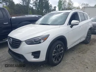 2016 Mazda CX-5 Grand Touring with VIN JM3KE2DY6G0622030, listed as a IAAI auction lot 41943466 with 110,283 mi miles. Bid and sale history available at carsss.com. Image 2.