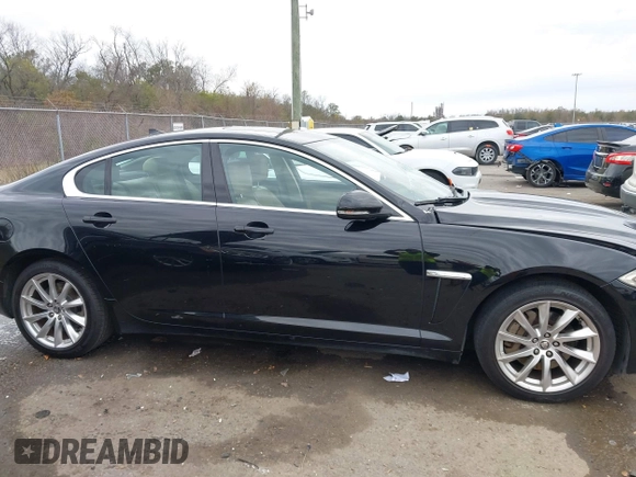 2013 Jaguar XF I4 RWD with VIN SAJWA0ES3DPS74714, listed as a IAAI auction lot 41298780 with 130,359 mi miles. Bid and sale history available at carsss.com. Image 13.