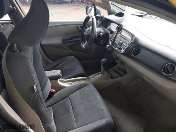 2011 Honda Insight EX with VIN JHMZE2H70BS011379, listed as a IAAI auction lot 41606111 with 220,543 mi miles. Bid and sale history available at carsss.com. Image 5.