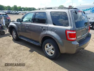 2012 Ford Escape XLT with VIN 1FMCU9D75CKC22907, listed as a IAAI auction lot 42571195 with 198,537 mi miles and . Bid and sale history available at DreamBid. Image 3.