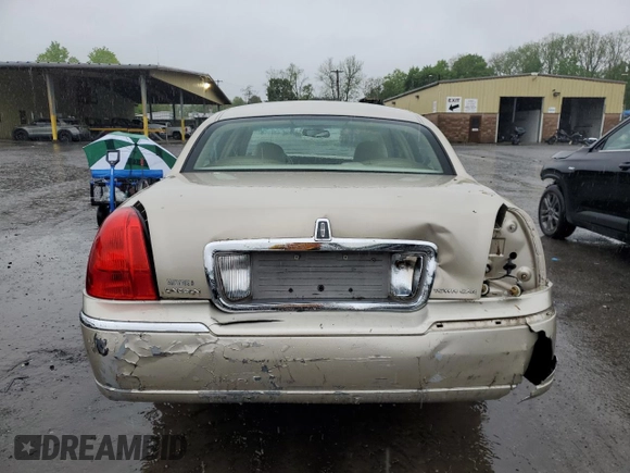 2006 Lincoln Town Car Signature z VIN 1LNHM81W76Y647607, wystawiony jako Copart lot #55507165 z przebiegiem 196 468 mil mil oraz Szkody całkowita. Historia ofert i sprzedaży dostępna na DreamBid. Obrazek 6.