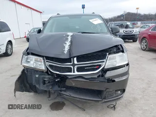 2017 Dodge Journey SE with VIN 3C4PDCABXHT694909, listed as a IAAI auction lot 41640828 with 188,657 mi miles and . Bid and sale history available at DreamBid. Image 12.