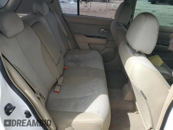 2009 Nissan Versa SL z VIN 3N1BC13E09L388802, wystawiony jako Copart lot #53904985 z przebiegiem 134 342 mil mil oraz Szkoda całkowita • Salvage title. Historia ofert i sprzedaży dostępna na DreamBid. Obrazek 11.