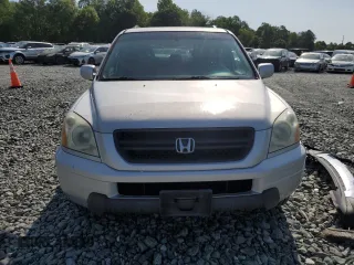 2005 Honda Pilot EX-L with VIN 2HKYF18505H500452, listed as a Copart auction lot 57552535 with 282,733 mi miles and Salvage title. Bid and sale history available at DreamBid. Image 5.