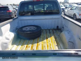 1998 Ford F-150 Standard with VIN 2FTZX1760WCA42124, listed as a IAAI auction lot 41845164 with 313,077 mi miles. Bid and sale history available at carsss.com. Image 13.