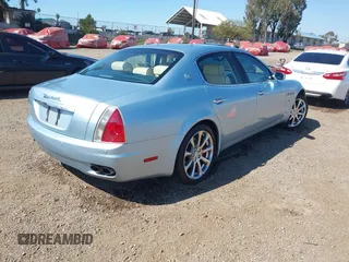 2007 Maserati Quattroporte with VIN ZAMFE39A670030778, listed as a IAAI auction lot 41670238 with 89,404 mi miles. Bid and sale history available at carsss.com. Image 4.