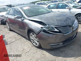 2014 Lincoln MKZ z VIN 3LN6L2GK3ER804770, wystawiony jako IAAI lot #42127057 z przebiegiem 147 623 mil mil oraz . Historia ofert i sprzedaży dostępna na DreamBid. Obrazek 1.