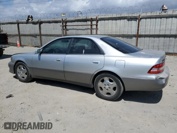 2000 Lexus ES 300 with VIN JT8BF28G9Y5100812, listed as a Copart auction lot 56790365 with 161,518 mi miles and Salvage title. Bid and sale history available at DreamBid. Image 2.