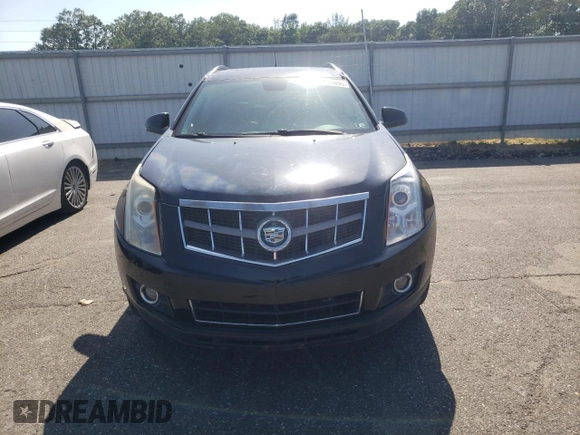2011 Cadillac SRX Premium Collection with VIN 3GYFNFEYXBS547540, listed as a Copart auction lot 62563895 with 107,136 mi miles and Salvage title. Bid and sale history available at DreamBid. Image 5.