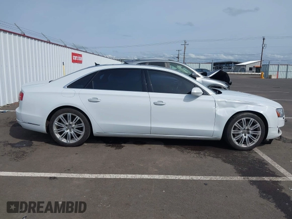 2015 Audi A8 4.0T with VIN WAU32AFD6FN039739, listed as a IAAI auction lot 41946401 with 102,668 mi miles and . Bid and sale history available at DreamBid. Image 13.