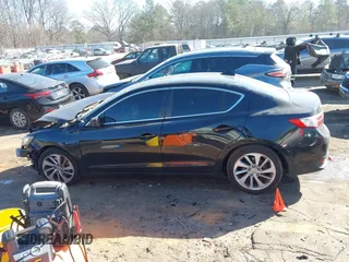 2017 Acura ILX with VIN 19UDE2F35HA016248, listed as a IAAI auction lot 41661341 with 136,000 mi miles. Bid and sale history available at carsss.com. Image 14.