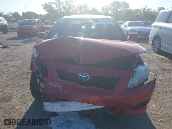 2010 Toyota Corolla with VIN JTDBU4EE5AJ067035, listed as a IAAI auction lot 42022402 with 106,616 mi miles. Bid and sale history available at carsss.com. Image 12.