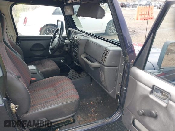 1999 Jeep Wrangler Sport with VIN 1J4FY19S9XP419330, listed as a IAAI auction lot 41913314 with 167,176 mi miles. Bid and sale history available at carsss.com. Image 5.