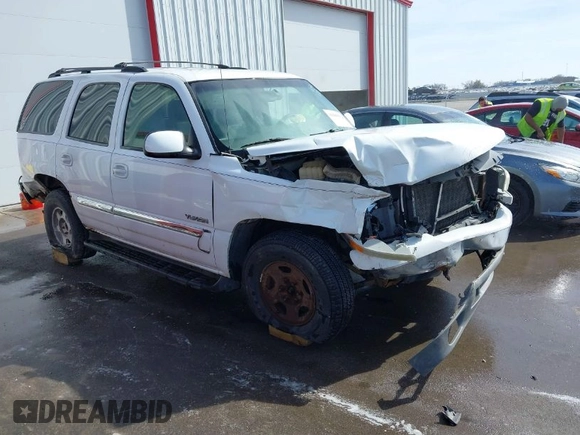 2003 GMC Yukon SLT with VIN 1GKEK13V23J300767, listed as a IAAI auction lot 41691632 with 251,849 mi miles. Bid and sale history available at carsss.com. Image 1.