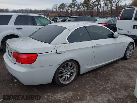 2011 BMW 3 Series 335i with VIN WBADX7C51BE742780, listed as a IAAI auction lot 41636961 with Not Provided miles and . Bid and sale history available at carsss.com. Image 4.
