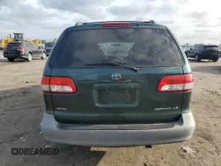 2001 Toyota Sienna LE with VIN 4T3ZF13C51U345619, listed as a Copart auction lot 71761094 with 165,000 mi miles and Salvage Title. Bid and sale history available at carsss.com. Image 6.