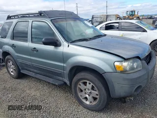2005 Ford Escape XLT z VIN 1FMYU931X5KA69477, wystawiony jako IAAI lot #42576724 z przebiegiem 143 747 mil mil oraz . Historia ofert i sprzedaży dostępna na DreamBid. Obrazek 1.