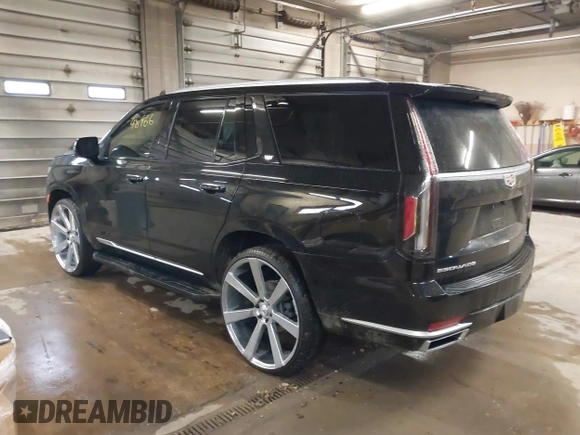 2021 Cadillac Escalade Luxury z VIN 1GYS4AKL7MR295510, wystawiony jako IAAI lot #38398966 z przebiegiem 26 228 mil mil oraz . Historia ofert i sprzedaży dostępna na DreamBid. Obrazek 3.