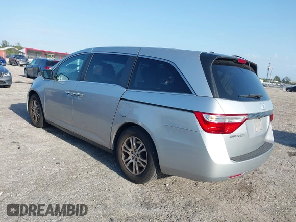 2013 Honda Odyssey EX-L with VIN 5FNRL5H67DB008575, listed as a IAAI auction lot 42008315 with 131,984 mi miles and . Bid and sale history available at carsss.com. Image 3.