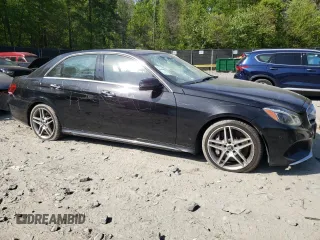 2014 Mercedes-Benz E 550 Sport with VIN WDDHF9BB3EB005375, listed as a Copart auction lot 53358995 with 144,503 mi miles and Salvage Title. Bid and sale history available at DreamBid. Image 4.