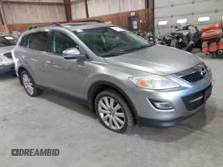 2010 Mazda CX-9 Touring with VIN JM3TB3MVXA0216459, listed as a IAAI auction lot 42228913 with 183,259 mi miles and . Bid and sale history available at carsss.com. Image 1.