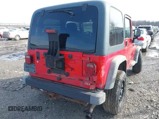 2003 Jeep Wrangler Sport with VIN 1J4FA49S53P305096, listed as a IAAI auction lot 41685209 with 165,247 mi miles. Bid and sale history available at carsss.com. Image 4.