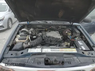 1998 Ford Explorer XLT with VIN 1FMZU32P0WUD21265, listed as a Copart auction lot 73702364 with 211,096 mi miles and Salvage title. Bid and sale history available at DreamBid. Image 12.