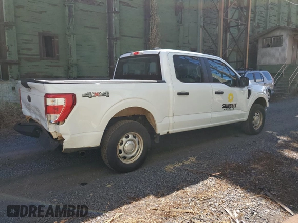 2023 Ford F-150 XL with VIN 1FTEW1EBXPKE80986, listed as a Copart auction lot 60357284 with 10,525 mi miles and Salvage Title. Bid and sale history available at carsss.com. Image 3.