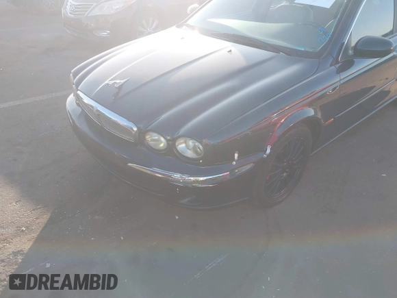 2007 Jaguar X-Type z VIN SAJWA51A57WJ26388, wystawiony jako IAAI lot #41166569 z przebiegiem 106 179 mil mil oraz . Historia ofert i sprzedaży dostępna na DreamBid. Obrazek 6.