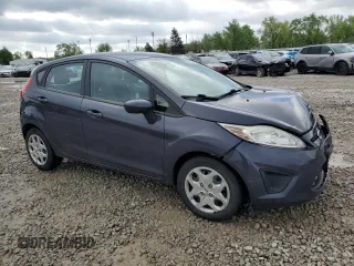 2013 Ford Fiesta S z VIN 3FADP4TJ6DM164936, wystawiony jako Copart lot #55470645 z przebiegiem 105 535 mil mil oraz Szkoda całkowita • Salvage title. Historia ofert i sprzedaży dostępna na DreamBid. Obrazek 4.