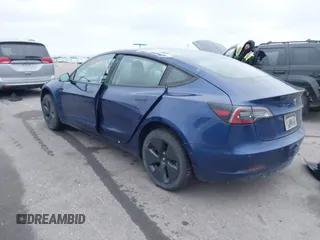 2021 Tesla Model 3 Long Range with VIN 5YJ3E1EB8MF848049, listed as a IAAI auction lot 40974331 with 61,462 mi miles. Bid and sale history available at carsss.com. Image 3.