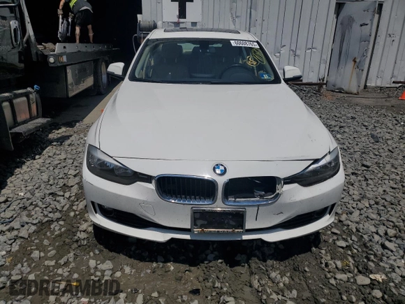 2014 BMW 3 Series 320i xDrive with VIN WBA3C3C51EF983592, listed as a Copart auction lot 60608765 with 195,061 mi miles and Salvage title. Bid and sale history available at DreamBid. Image 5.