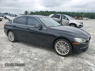 2014 BMW 3 Series 328i with VIN WBA3A5G54ENP31997, listed as a Copart auction lot 60720765 with 107,183 mi miles and Salvage title. Bid and sale history available at DreamBid. Image 4.