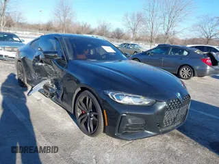 2021 BMW 4 Series M440i xDrive with VIN WBA13AR0XMCF50380, listed as a IAAI auction lot 41200404 with 26,102 mi miles and . Bid and sale history available at DreamBid. Image 1.