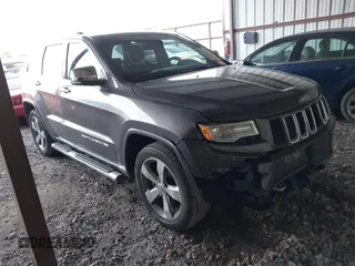 2014 Jeep Grand Cherokee Overland with VIN 1C4RJECG2EC473351, listed as a IAAI auction lot 41480515 with 114,556 mi miles. Bid and sale history available at carsss.com. Image 1.