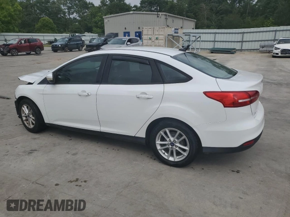 2015 Ford Focus SE with VIN 1FADP3F21FL246821, listed as a Copart auction lot 59732635 with 135,752 mi miles and Salvage title. Bid and sale history available at DreamBid. Image 2.
