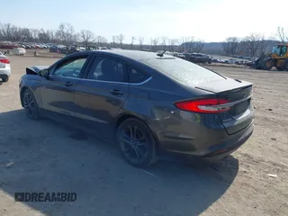 2018 Ford Fusion SE z VIN 3FA6P0LU6JR118226, wystawiony jako IAAI lot #41811406 z przebiegiem 165 352 mil mil oraz . Historia ofert i sprzedaży dostępna na DreamBid. Obrazek 3.