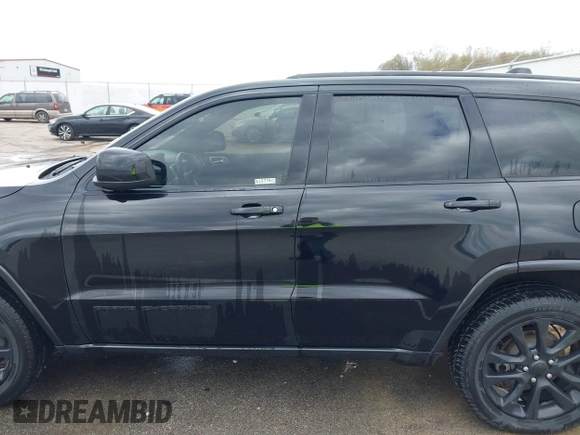 2018 Jeep Grand Cherokee Laredo with VIN 1C4RJFAG7JC468391, listed as a IAAI auction lot 42010443 with 91,585 mi miles and . Bid and sale history available at DreamBid. Image 14.