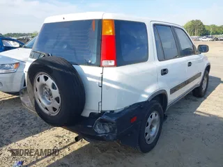 2000 Honda CR-V LX with VIN JHLRD2844YC011658, listed as a IAAI auction lot 42117486 with 185,206 mi miles. Bid and sale history available at carsss.com. Image 6.